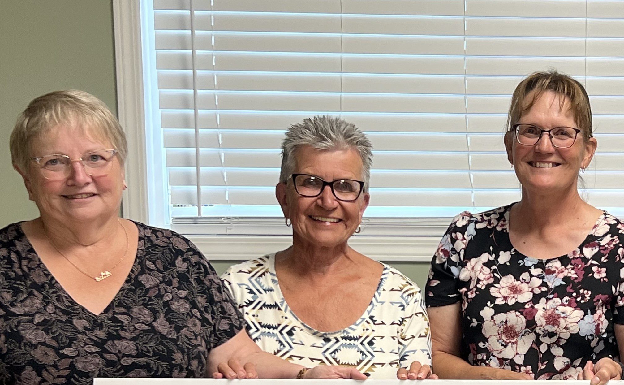 Barrhead Cancer Clinic Nurses and Road To Home Trip Coordinator after receiving $10000 award For Cancer Ride Share program from 100 Women Who Care -Westlock